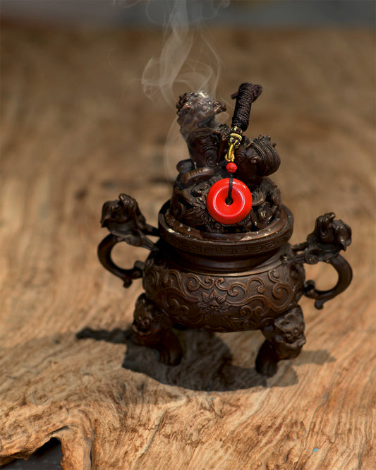 this piece draws upon the profound principles of ""Heaven is round, Earth is square"" and ""the Tao follows Nature."" It uses the Taiji 'twin fish' to symbolize the harmony of yin and yang, and the 'Peace Buckle' shape to represent the perfection of Heaven and Earth. It is a personal ritual implement that merges Taoist philosophy with protective spiritual energy.