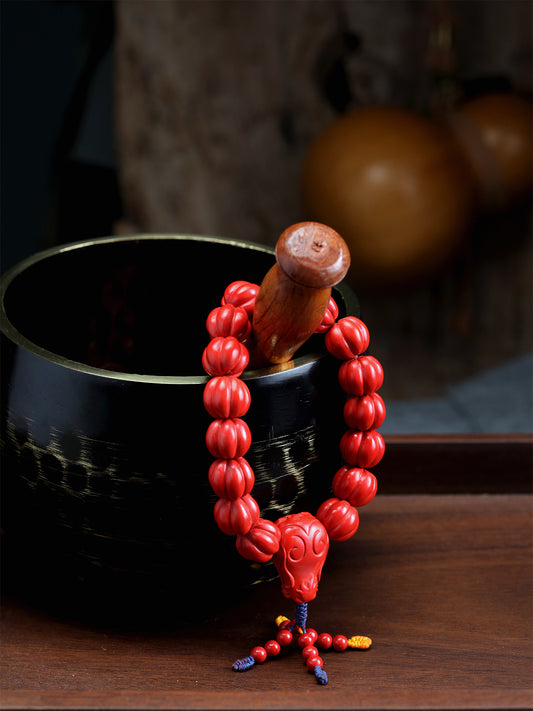 this piece merges the energies of authority, abundance, and protection from Eastern wisdom into one. Crafted from refined cinnabar into the dual forms of a pumpkin and a dragon head, it fuses the profound mystery of the Tao's natural way into a small space. It is an energy accessory that embodies a thousand-year spiritual tradition and contemporary craftsmanship.