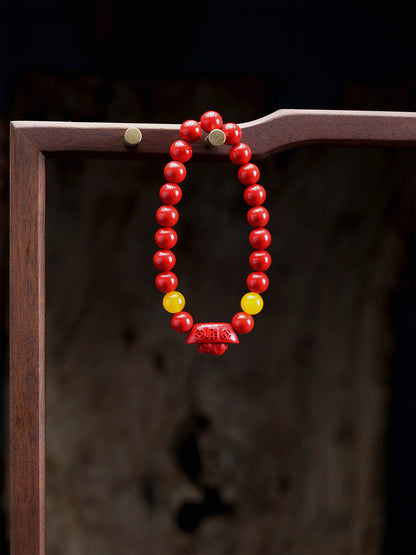 this piece draws upon the auspicious signs of the ""Pixiu gathering wealth, and the Lotus Pod gathering connections."" Crafted from refined Chenzhou Cinnabar into the forms of a guardian Pixiu and a seed-bearing Lotus Pod, it embodies the principle of ""All Requests Granted, and Ten Thousand Connections Harmonized."" It is a supreme ritual implement that merges a thousand-year spiritual tradition with profound protective energy.