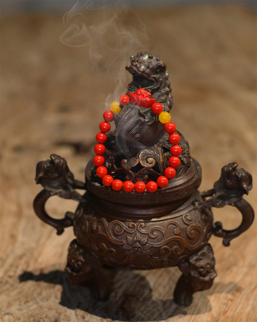 this piece draws upon the auspicious signs of the ""Pixiu gathering wealth, and the Lotus Pod gathering connections."" Crafted from refined Chenzhou Cinnabar into the forms of a guardian Pixiu and a seed-bearing Lotus Pod, it embodies the principle of ""All Requests Granted, and Ten Thousand Connections Harmonized."" It is a supreme ritual implement that merges a thousand-year spiritual tradition with profound protective energy.