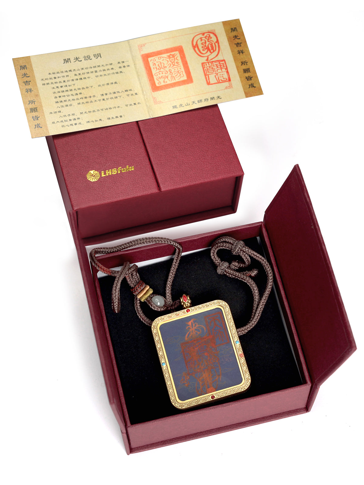 this talisman is personally hand-drawn by an orthodox Taoist master. An initiated High Priest then inscribes the talisman, channeling the sacred energy of the ancestral court, before sealing it within an exquisitely crafted Ghau box. This Peace &amp; Safety Talisman serves to protect your body and safeguard your well-being, warding off malevolent influences and neutralizing negative energy. It helps you steer clear of disasters, mitigates the impact of unforeseen accidents, and provides the wearer with comp